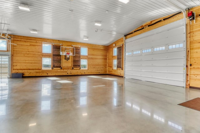 23351 County Highway 22, Lake View Twp, MN 56501 - garage featuring wooden walls