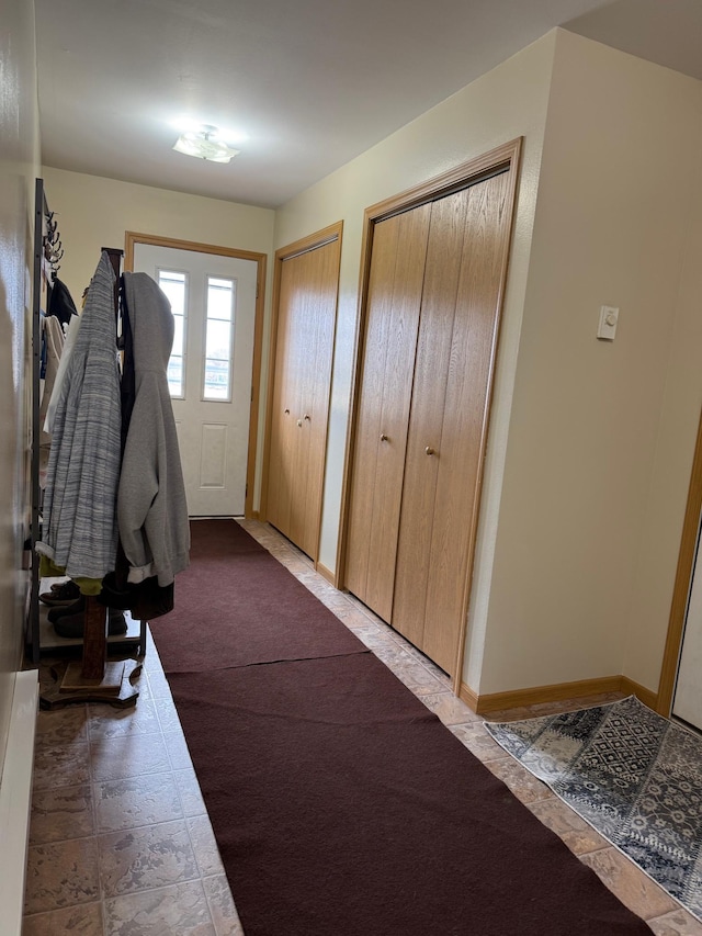 mudroom featuring baseboards