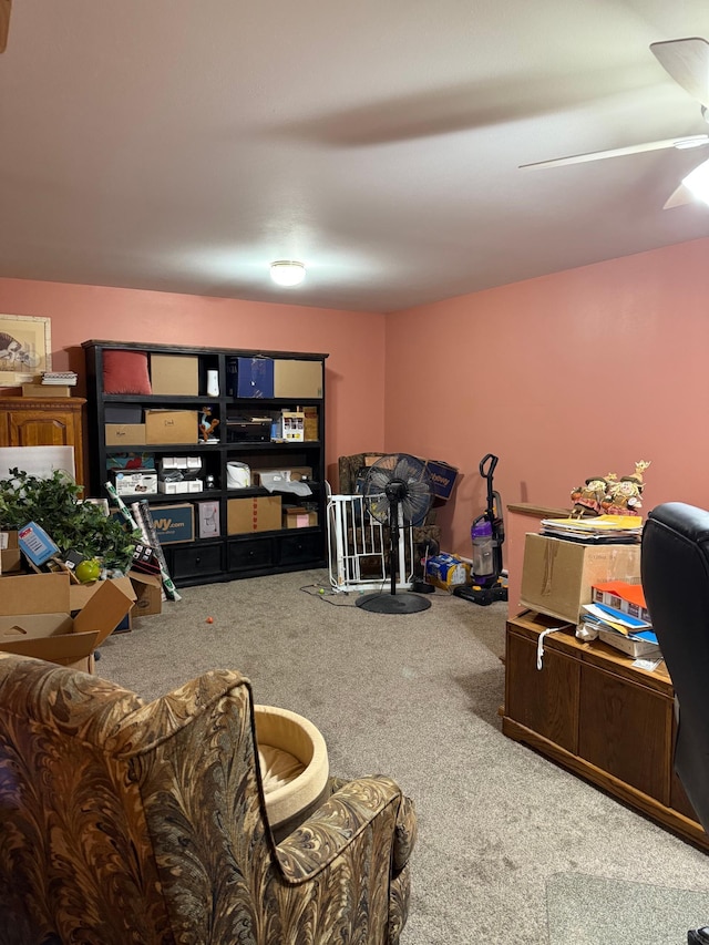 interior space with carpet and ceiling fan
