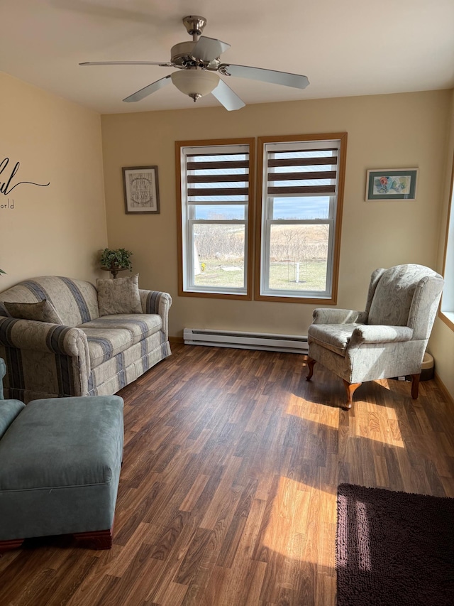 living room with a healthy amount of sunlight, a baseboard radiator, and dark wood-type flooring
