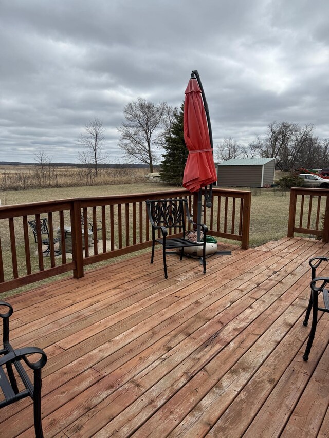 deck featuring an outdoor structure