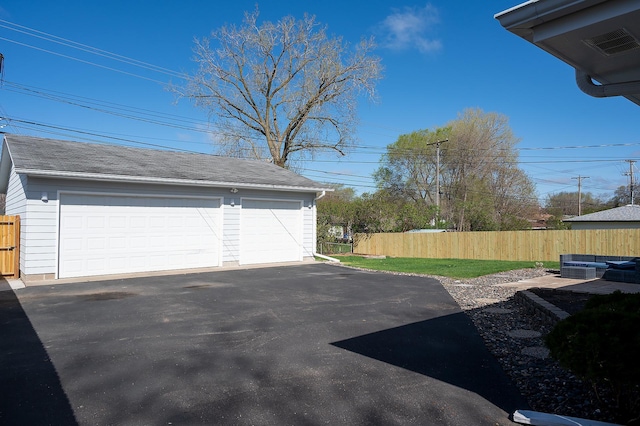 detached garage with fence