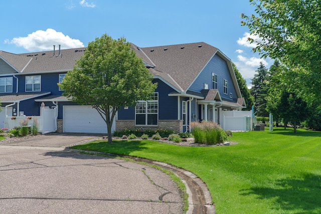 428 Hickory Ln N, Oakdale, MN 55128 - craftsman inspired home with driveway and brick siding