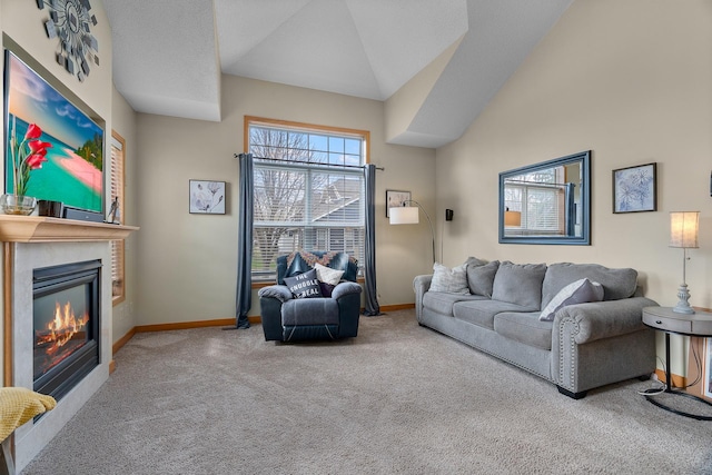 428 Hickory Ln N, Oakdale, MN 55128 - living room with carpet floors, lofted ceiling, and a glass covered fireplace