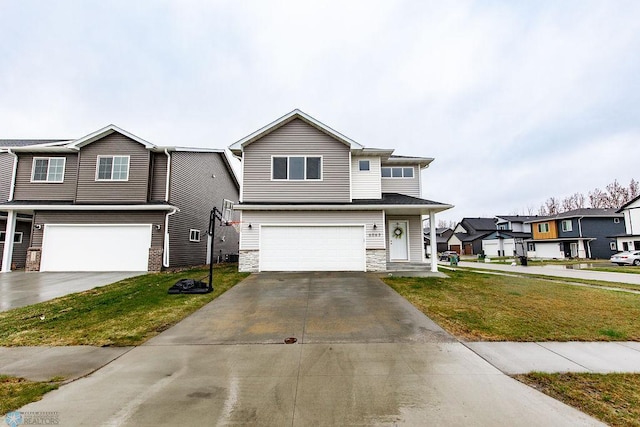 traditional-style home featuring a front lawn, stone siding, an attached garage, driveway, and a residential view