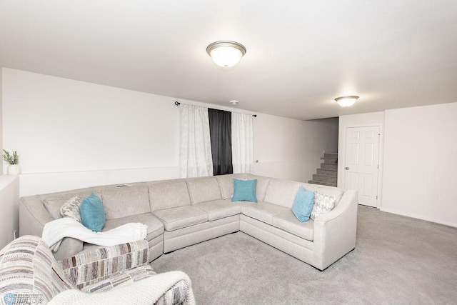 living room with stairs and carpet floors