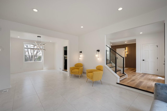 interior space with recessed lighting, a notable chandelier, and stairway
