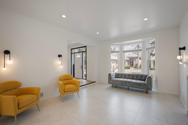 sitting room featuring recessed lighting, baseboards, and visible vents