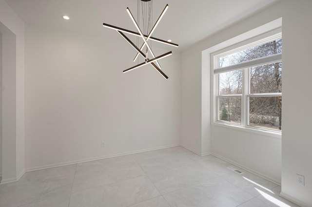 unfurnished dining area with recessed lighting, baseboards, an inviting chandelier, and visible vents