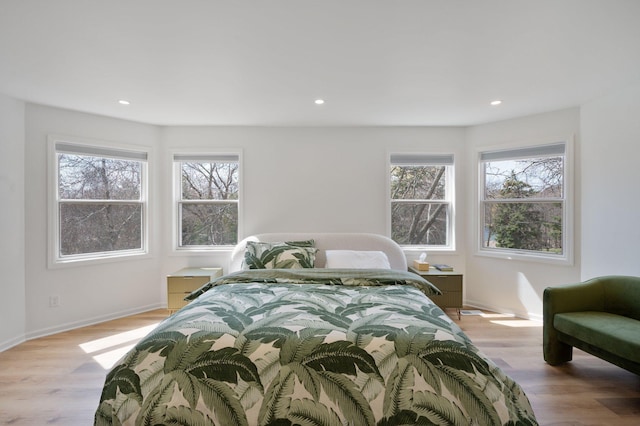 bedroom featuring recessed lighting and light wood-style flooring