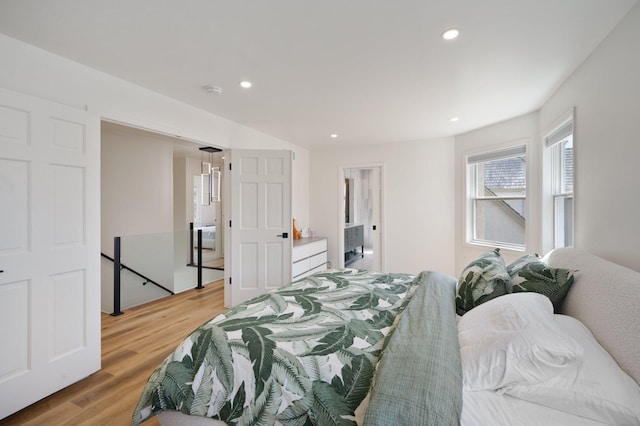 bedroom with recessed lighting and light wood-type flooring