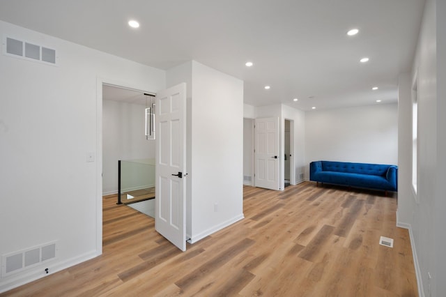 interior space with visible vents, recessed lighting, and light wood-style floors