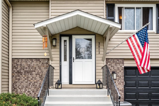 3903 Gershwin Ave N, Oakdale, MN 55128 - doorway to property featuring brick siding