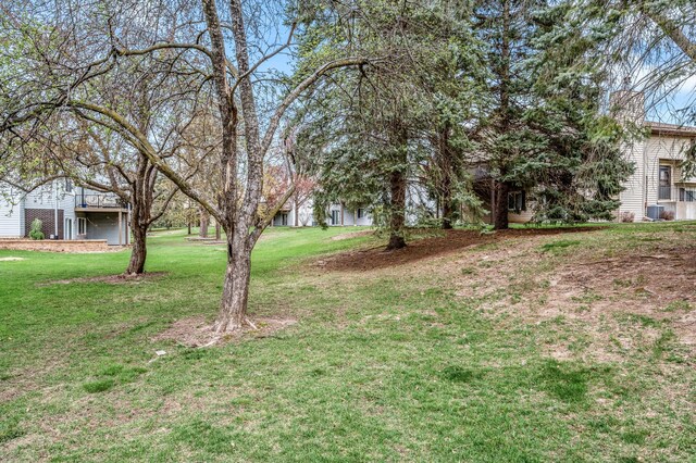 3903 Gershwin Ave N, Oakdale, MN 55128 - view of yard with central AC unit