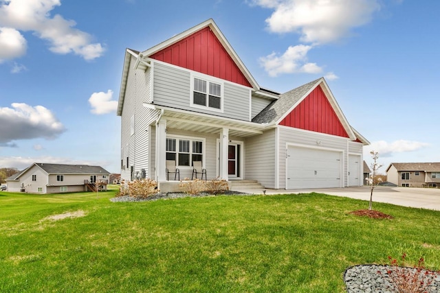 2120 Violet Ln, Faribault, MN 55021 - craftsman house featuring an attached garage, a front yard, board and batten siding, concrete driveway, and a porch
