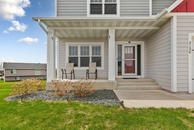 2120 Violet Ln, Faribault, MN 55021 - entrance to property with a lawn and a porch