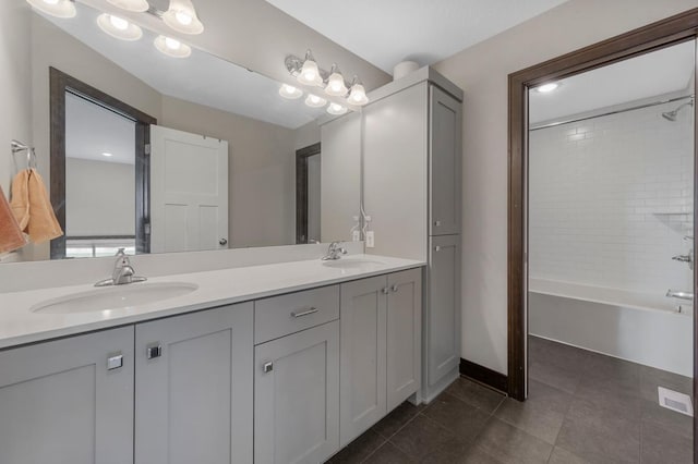 2120 Violet Ln, Faribault, MN 55021 - bathroom featuring double vanity, baseboards, a sink, and tile patterned flooring