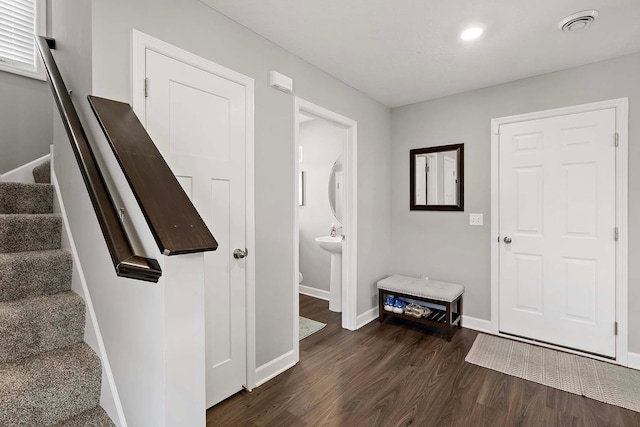 2166 Island Ct, Lino Lakes, MN 55038 - entrance foyer featuring dark wood-style floors, stairs, baseboards, and recessed lighting