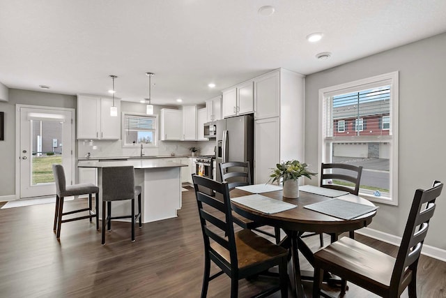 2166 Island Ct, Lino Lakes, MN 55038 - dining space with dark wood-style flooring, baseboards, and recessed lighting