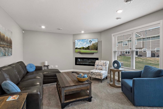 2166 Island Ct, Lino Lakes, MN 55038 - living area featuring carpet, a glass covered fireplace, recessed lighting, and baseboards