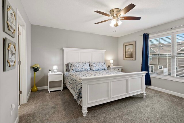 2166 Island Ct, Lino Lakes, MN 55038 - bedroom featuring carpet, baseboards, and a ceiling fan