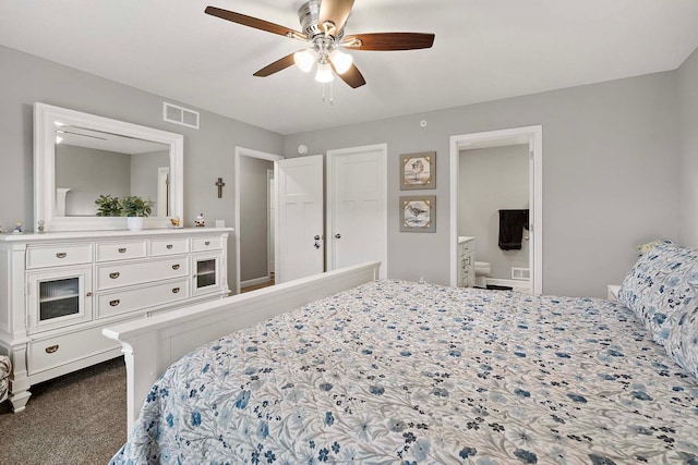 2166 Island Ct, Lino Lakes, MN 55038 - bedroom featuring dark colored carpet, ensuite bathroom, and a ceiling fan