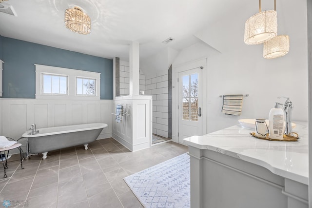 full bathroom with visible vents, marble finish floor, a walk in shower, and a wealth of natural light