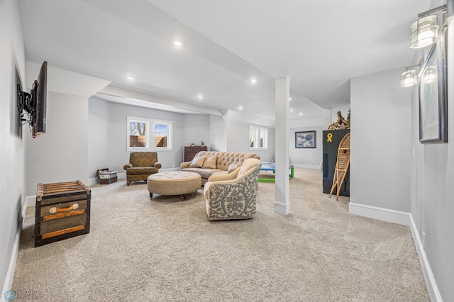 carpeted living room with a healthy amount of sunlight, baseboards, and recessed lighting