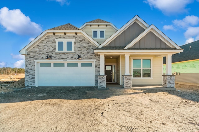 15149 Quince St NW, Andover, MN 55304 - craftsman inspired home with a garage, board and batten siding, driveway, and stone siding
