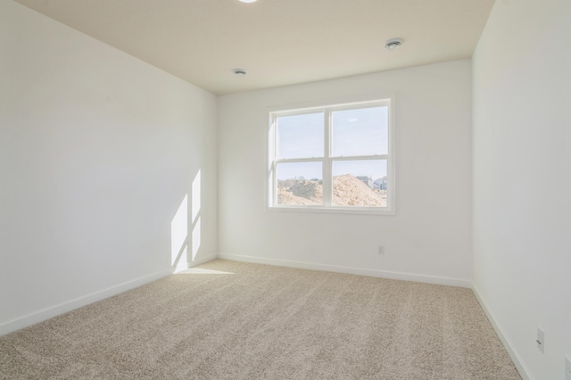 15149 Quince St NW, Andover, MN 55304 - empty room with baseboards and light carpet