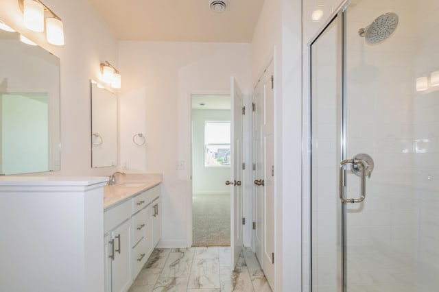 15149 Quince St NW, Andover, MN 55304 - full bath with vanity, visible vents, marble finish floor, baseboards, and a stall shower