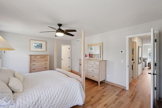 4994 Obsidian Way, Victoria, MN 55386 - bedroom with light wood-style floors, baseboards, and ceiling fan
