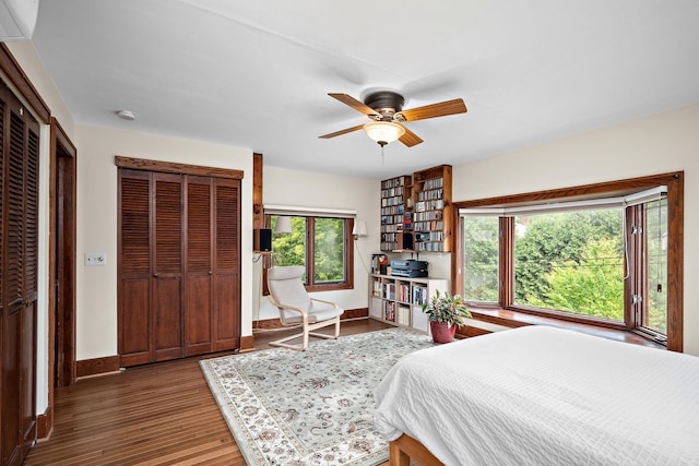 2511 12th Ave N, Minneapolis, MN 55411 - bedroom featuring baseboards, wood finished floors, and ceiling fan
