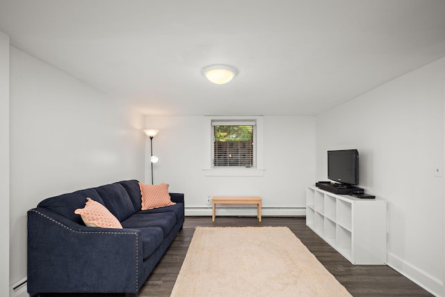 2511 12th Ave N, Minneapolis, MN 55411 - living room featuring a baseboard heating unit, dark wood-style flooring, baseboards, and a baseboard radiator