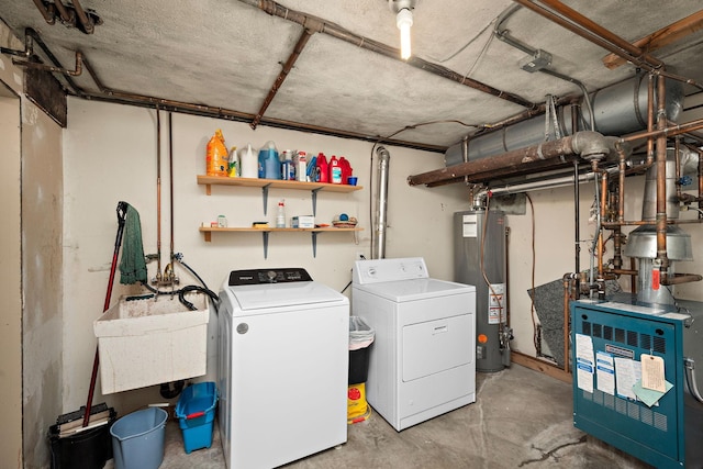 2511 12th Ave N, Minneapolis, MN 55411 - laundry area with gas water heater, separate washer and dryer, and a heating unit