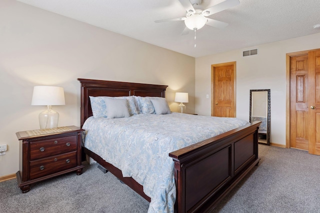 bedroom featuring baseboards, ceiling fan, light carpet, and visible vents