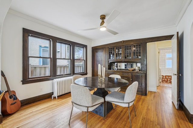2170 Palace Ave, Saint Paul, MN 55105 - dining space with baseboards, radiator, and light wood finished floors