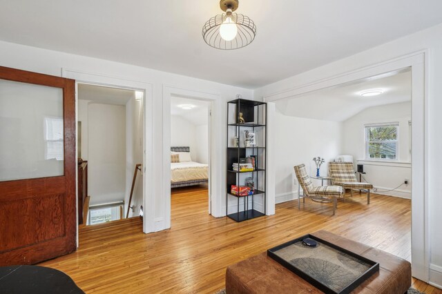 2170 Palace Ave, Saint Paul, MN 55105 - living area featuring light wood-style flooring and lofted ceiling