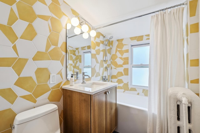 2170 Palace Ave, Saint Paul, MN 55105 - bathroom with tile walls, vanity, toilet, and shower / tub combo with curtain