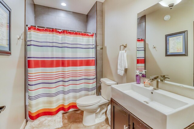 bathroom with vanity, recessed lighting, curtained shower, and toilet