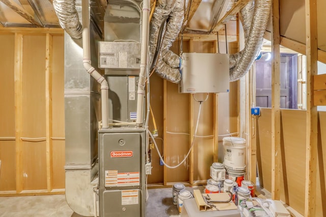 utility room featuring heating unit