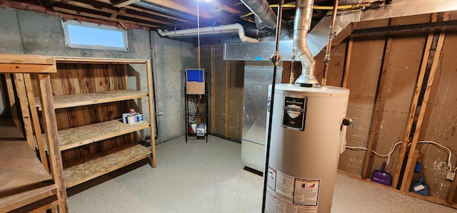 utility room with gas water heater