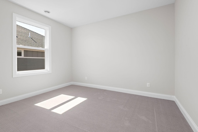 7521 Ocean Ave, Otsego, MN 55330 - spare room with baseboards and carpet
