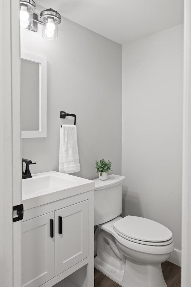 6360 Teton Ln, Chanhassen, MN 55317 - bathroom featuring vanity and wood finished floors