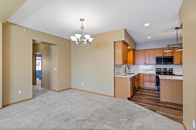 14012 54th Ave N Unit 4, Plymouth, MN 55446 - kitchen with stainless steel microwave, black electric range oven, a sink, light countertops, and dark carpet