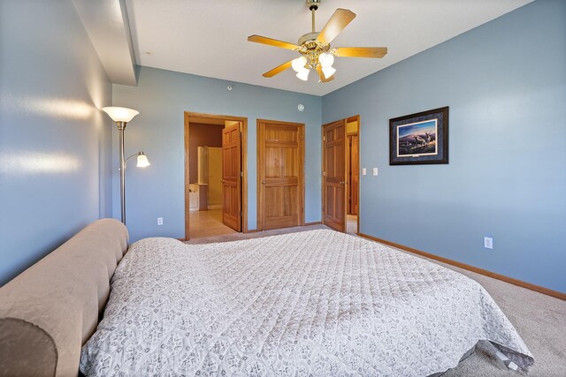 14012 54th Ave N Unit 4, Plymouth, MN 55446 - carpeted bedroom with baseboards, ceiling fan, and connected bathroom