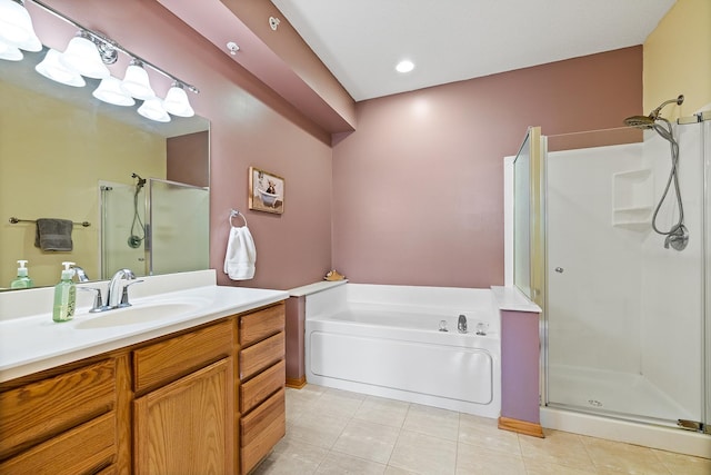 14012 54th Ave N Unit 4, Plymouth, MN 55446 - full bath with a stall shower, a garden tub, tile patterned flooring, and vanity