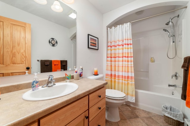 bathroom with toilet, shower / bath combo with shower curtain, and vanity