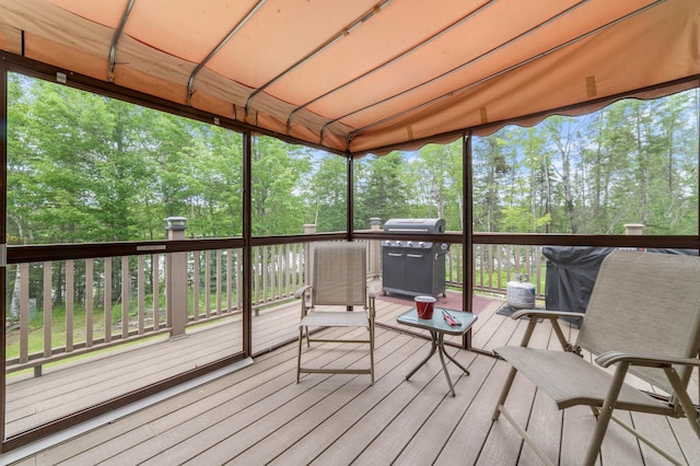 wooden deck with grilling area