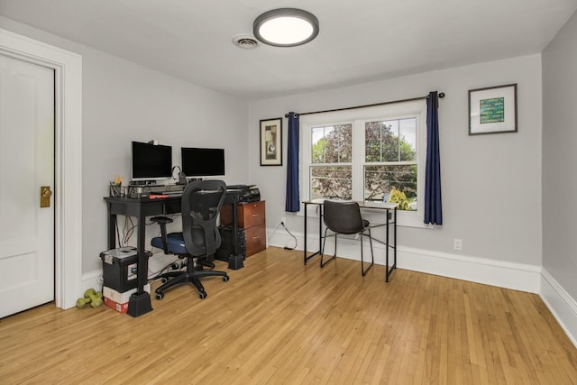 1449 Laurel Ave, Saint Paul, MN 55104 - home office featuring wood finished floors and baseboards